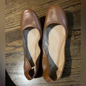 Light brown slightly worn flats